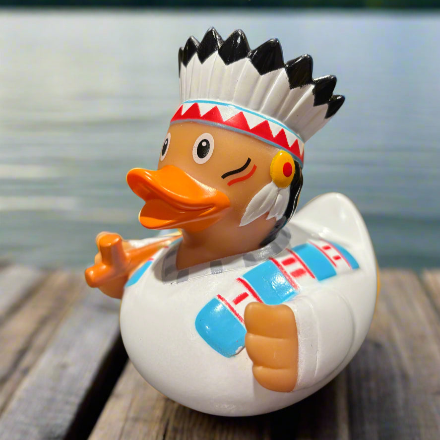 Colorful figurine of a rubber duck with a headdress