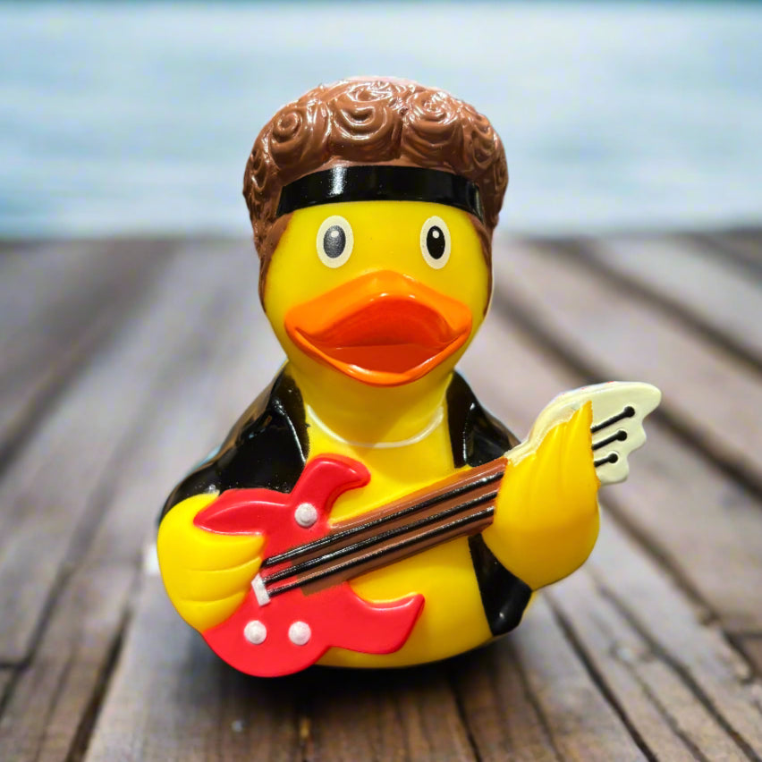 Rubber duck with a red guitar